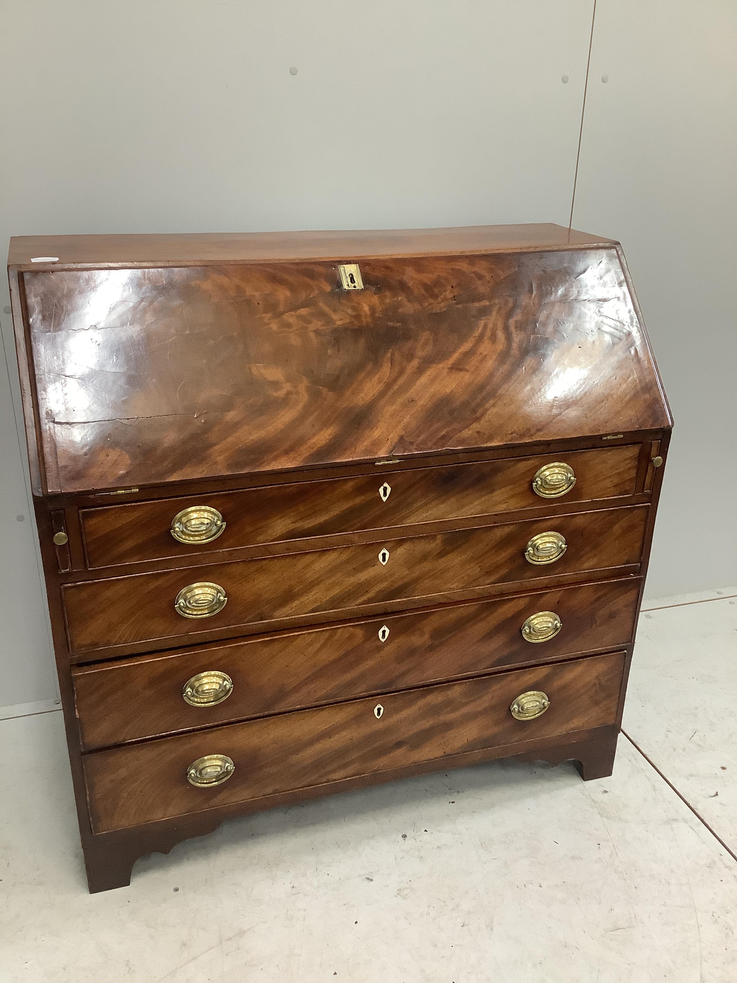 A George III mahogany bureau, width 106cm, depth 52cm, height 105cm CITES Submission reference UCPXH1XH